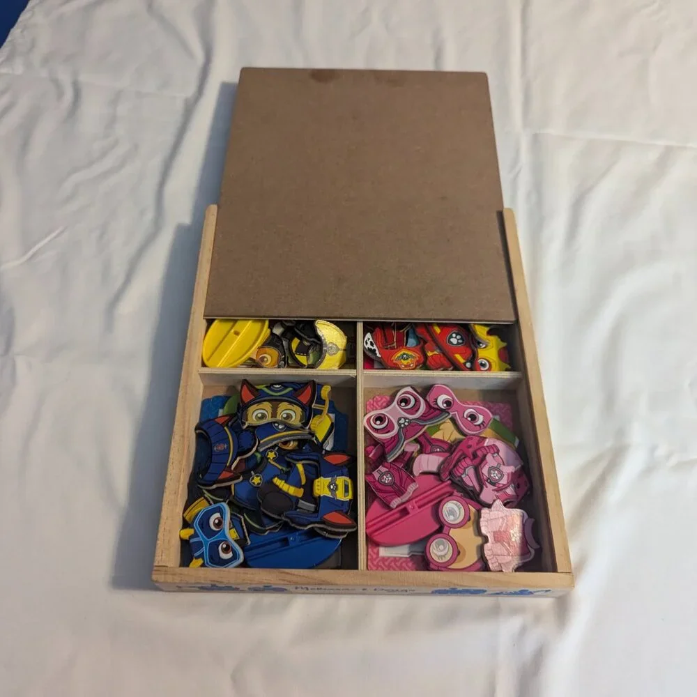 Paw Patrol Puzzle, by Melissa & Doug, and a plush Chase